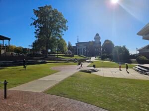 Duluth Town Green with City Hall in the background on a sunny afternoon