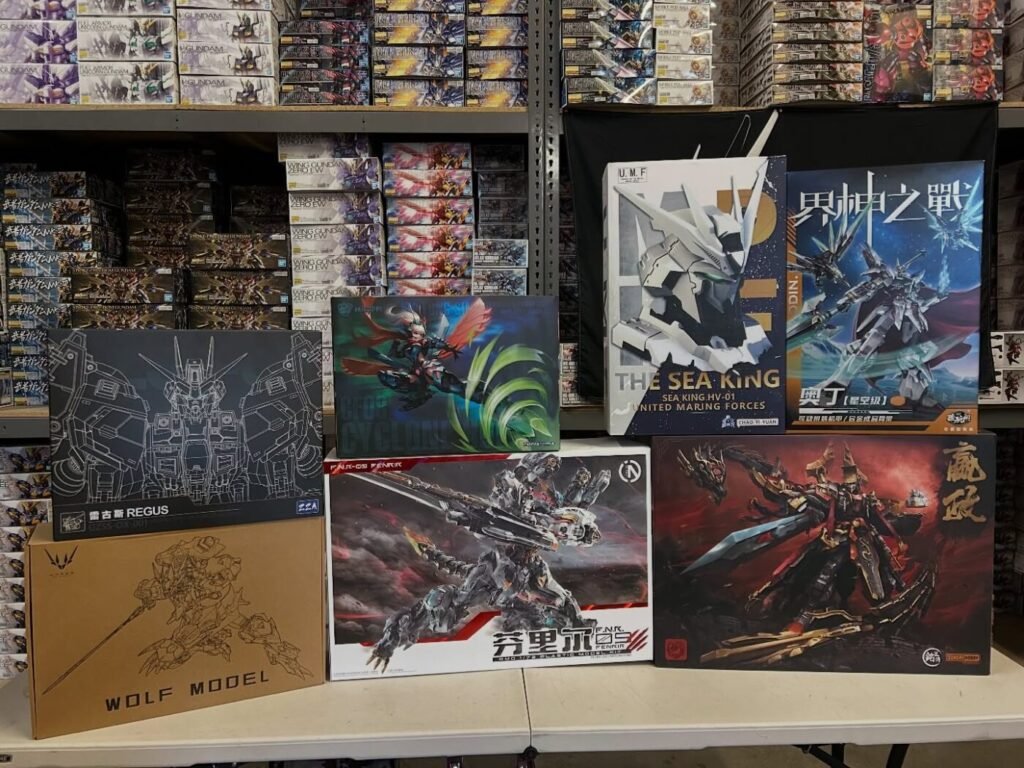 Boxes of Gundam and robot model kits displayed inside The Gundam Place hobby shop in Cumming, Georgia.