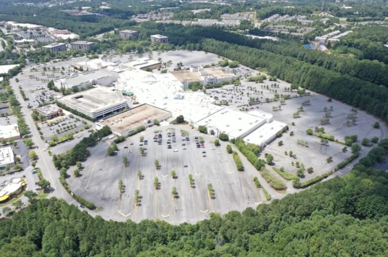 Aerial view of North Point Mall with large parking lots and tree-lined edges