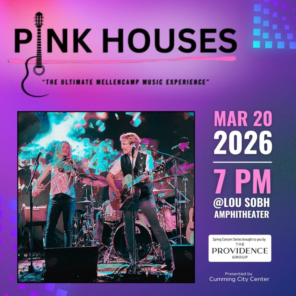 Pink Houses Mellencamp tribute band performing live at Lou Sobh Amphitheater in Cumming City Center with colorful stage lights and crowd atmosphere
