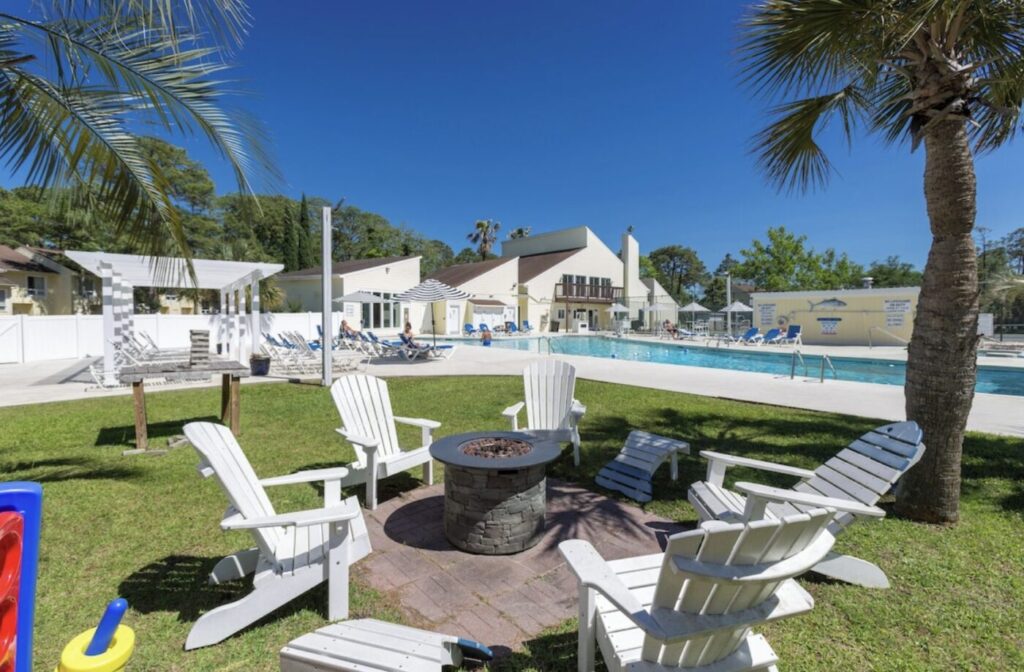 Indoor pool, outdoor pool, pool umbrellas, sun loungers at the Links Resort, North Myrtle Beach