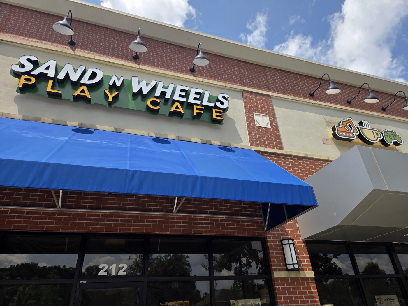 A Café Built Around Tiny Excavators Is Coming to McGinnis Ferry Road