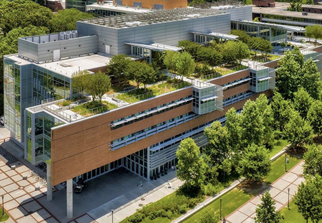 Georgia Tech’s in-state admission rate has fallen sharply since 2017. A modern Georgia Tech campus building with rooftop greenery and surrounding trees.