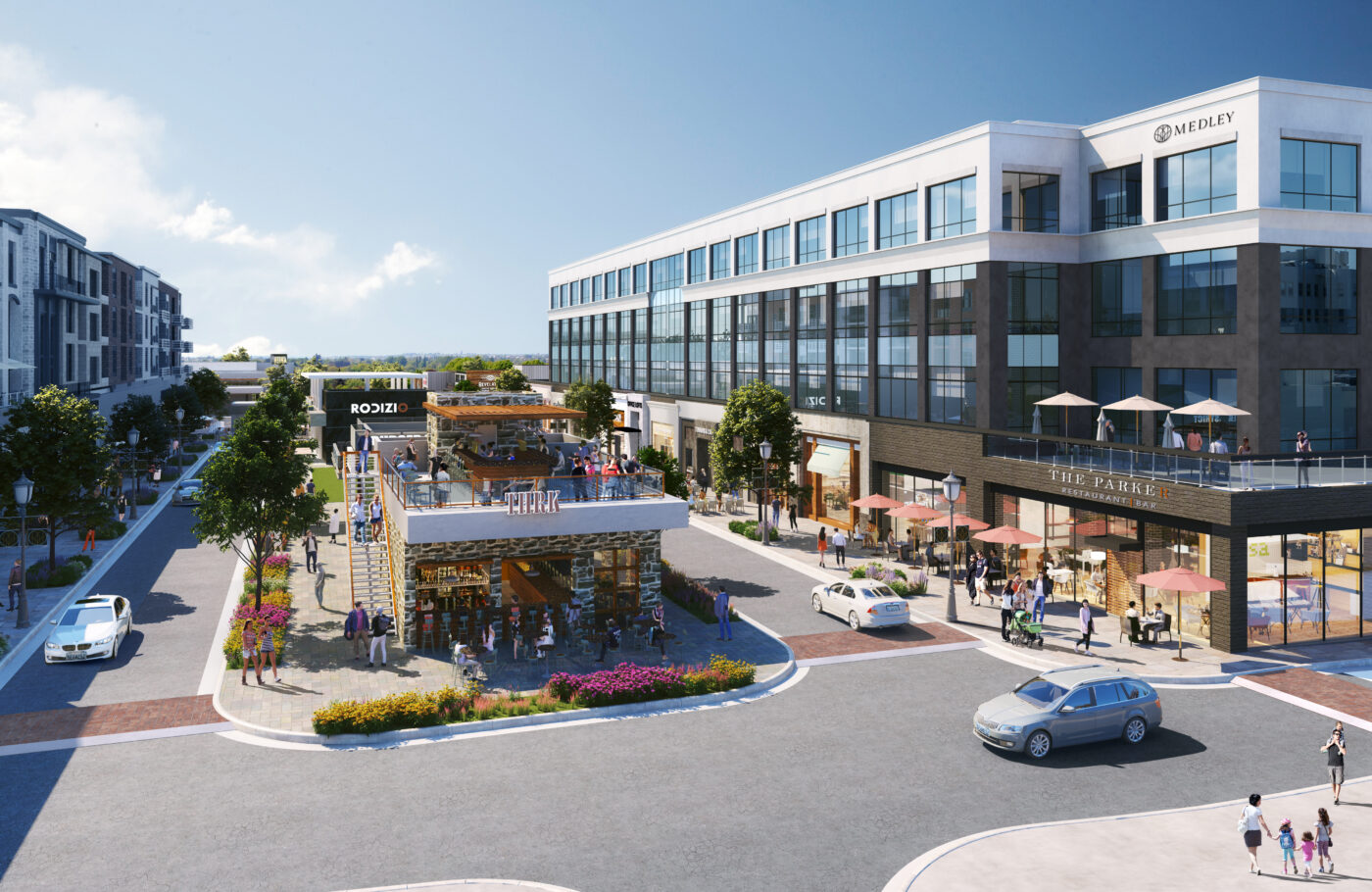 Rendering of modern office and retail buildings with patios, storefronts, landscaped sidewalks and parked cars