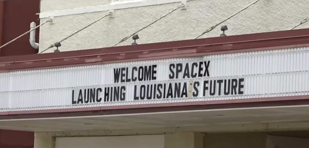 A marquee sign reads 'Welcome SpaceX' and 'Launching Louisiana's future'