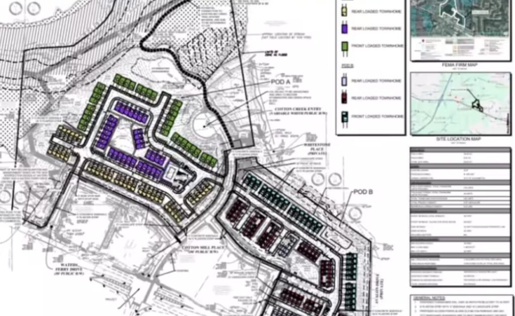 Colored site plan showing rows of planned townhomes, internal roads, open space and a creek crossing.