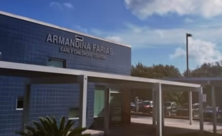 Exterior of Armandina Farias Early Childhood Center under a partly cloudy sky.