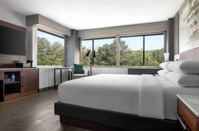 Renovated king guest room with large windows at Atlanta Marriott Peachtree Corners
