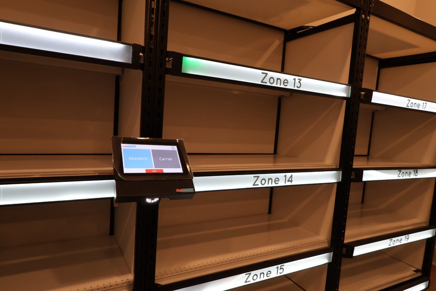 Shelving and a HelloPackage kiosk inside Prelude’s package room.