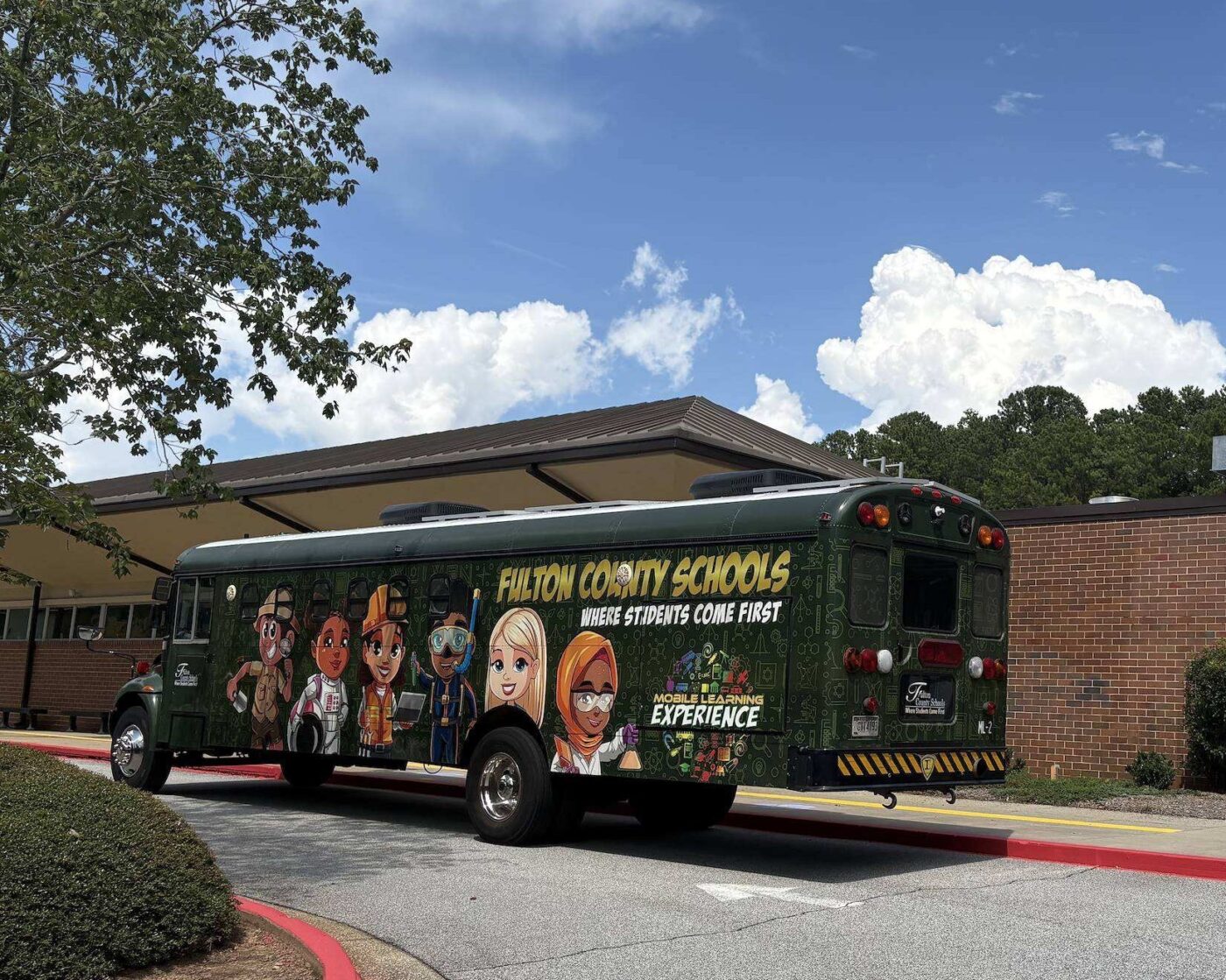 Fulton County Schools’ Mobile Learning Experience STEAMbus outside the Teaching Museum.