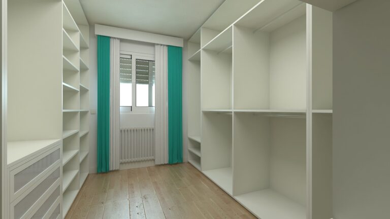 Empty dressing room with white built-in shelves, wood flooring and teal curtains at a window.
